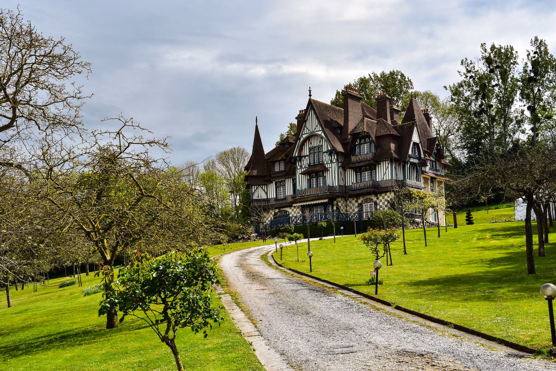 A country manor approached through parkland