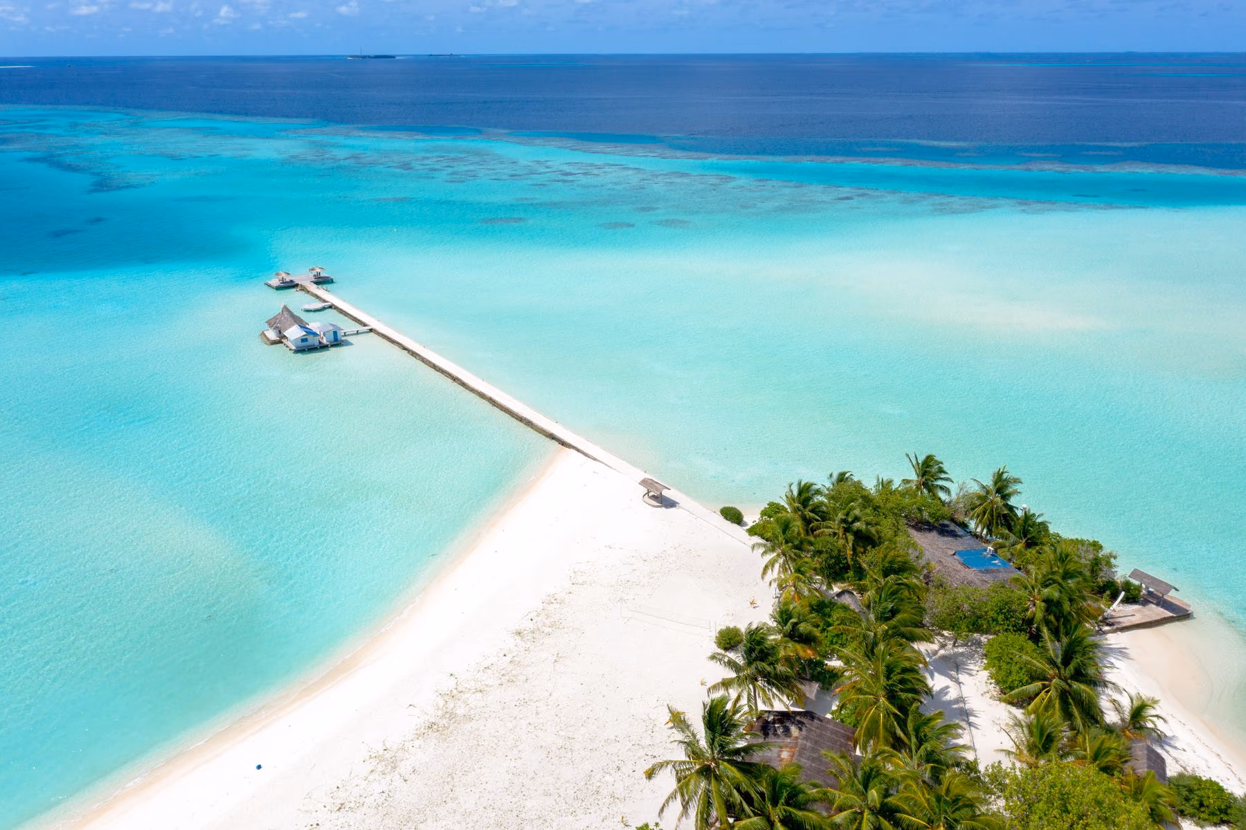 A private island surrounded by clear turquoise water